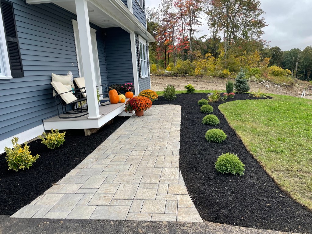 Larson’s Garden Center and Landscaping | Larson’s Garden Center and Landscaping House walk way with fresh laid mulch